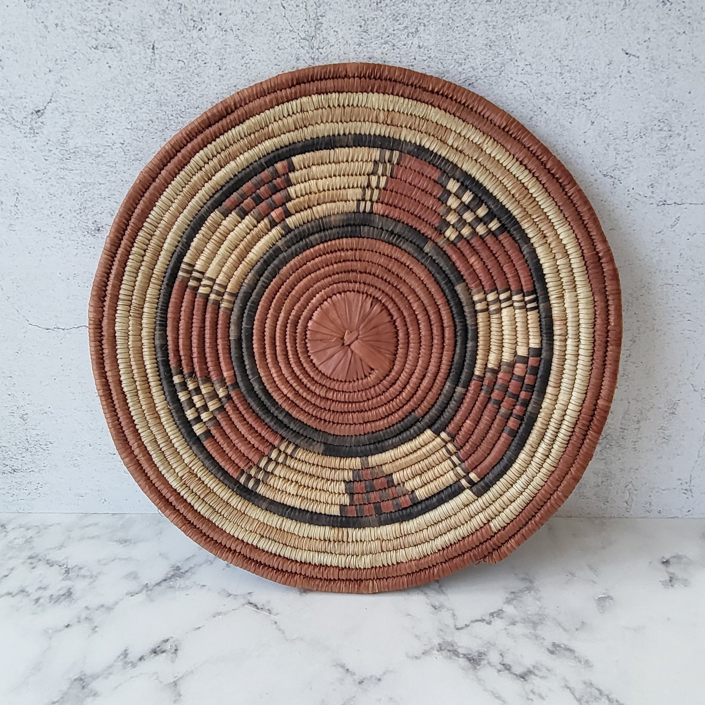 African Coiled Tribal Flat Basket – Handmade Wall Decor in Natural Earth Tones  – 11.5" Dia.