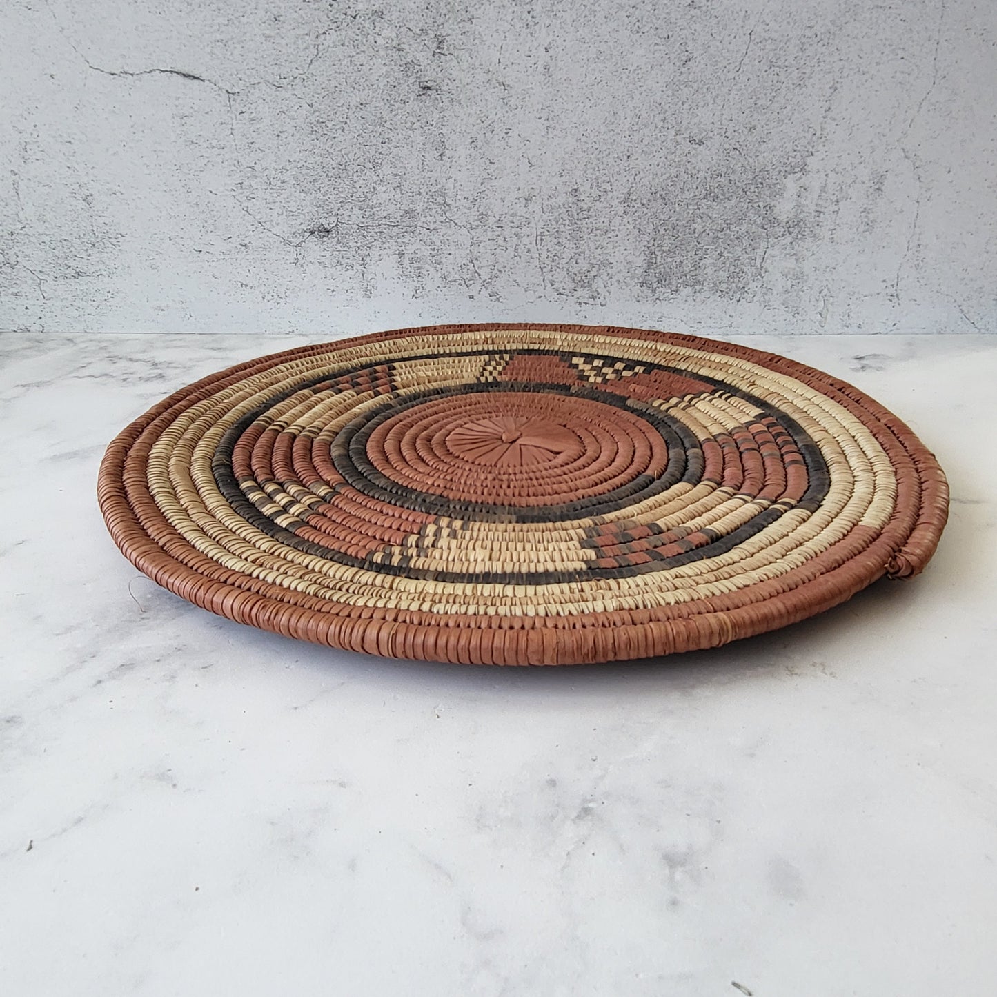 African Coiled Tribal Flat Basket – Handmade Wall Decor in Natural Earth Tones  – 11.5" Dia.