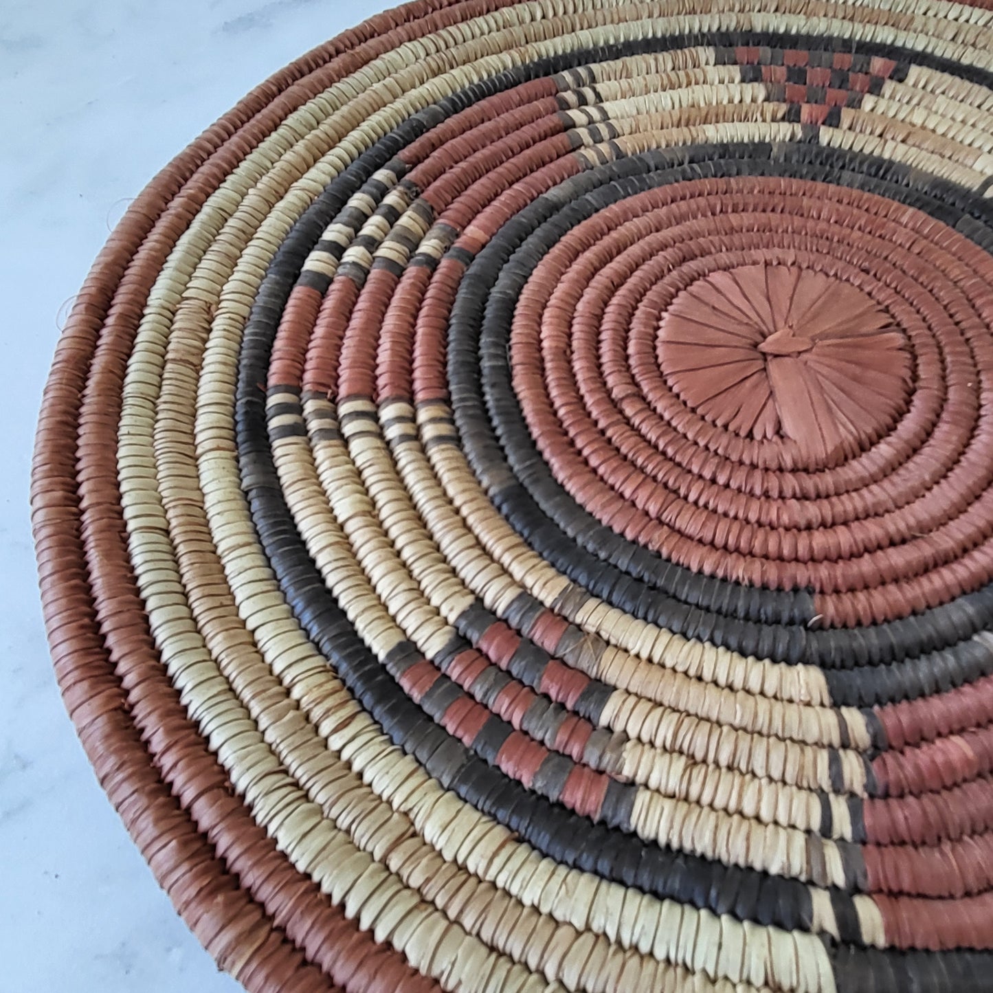 African Coiled Tribal Flat Basket – Handmade Wall Decor in Natural Earth Tones  – 11.5" Dia.