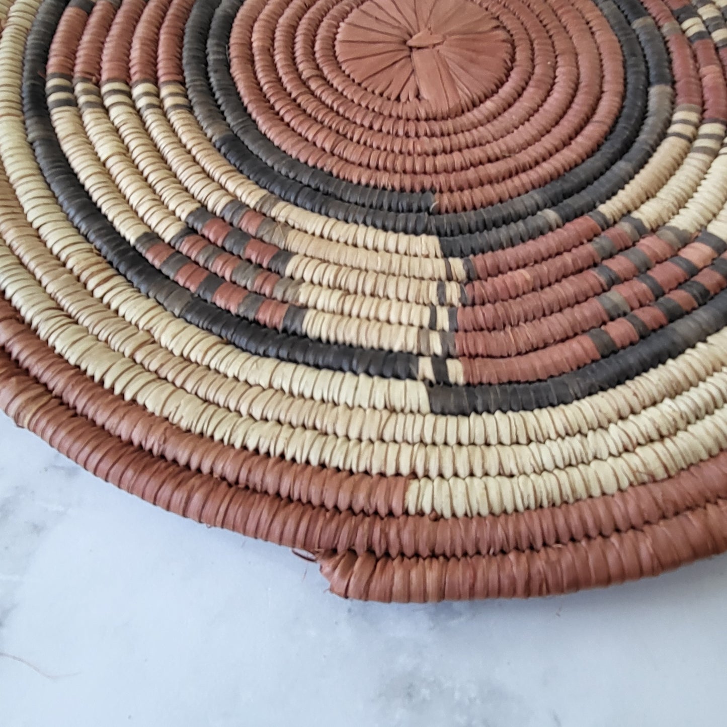 African Coiled Tribal Flat Basket – Handmade Wall Decor in Natural Earth Tones  – 11.5" Dia.