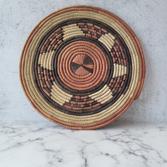 African Coiled Tribal Flat Basket – Handmade Wall Decor in Natural Earth Tones – 12" Dia.