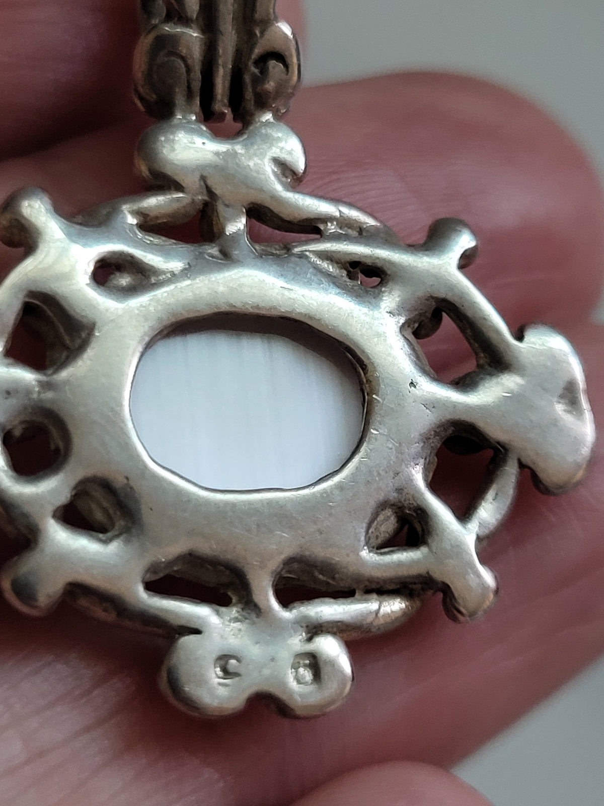 Vintage Sterling Silver White Cat’s Eye Scrollwork Pendant